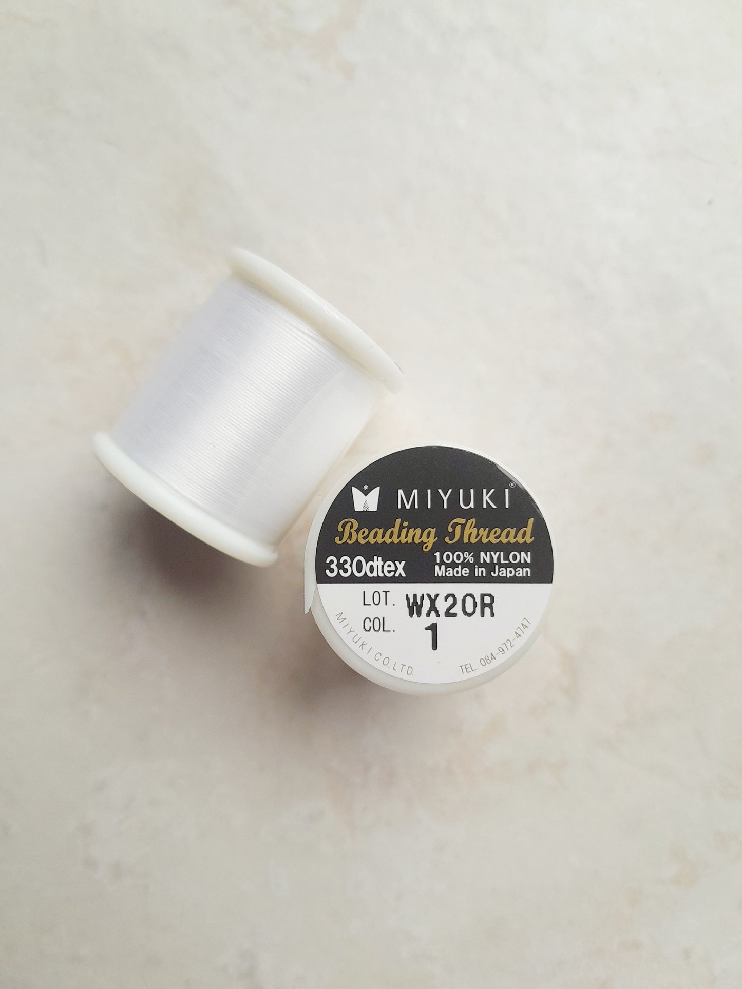 1 bobine de 50m fil nylon MIYUKI colour white 01